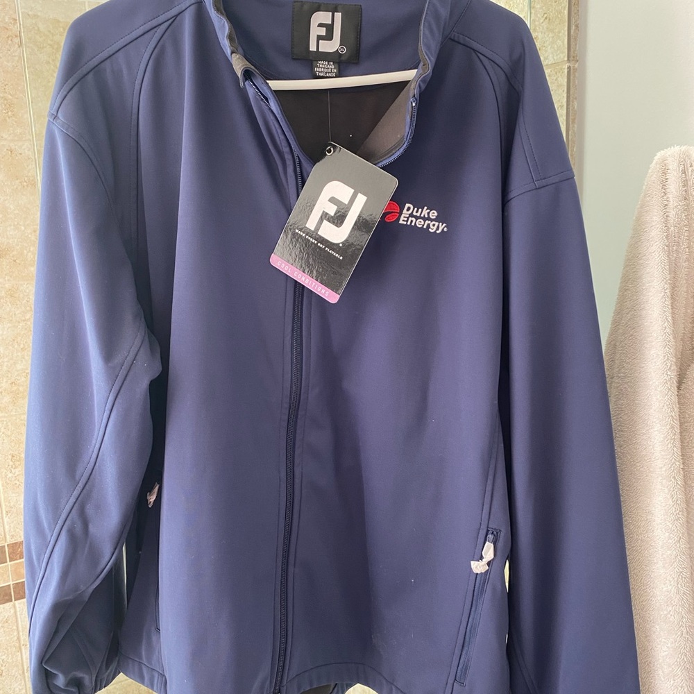 Foot joy duke energy sponsored golf jacket. New with tags